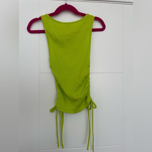 3/$15 Super cute top in bright green with side tie detail that can shorten top - Picture 3 of 3